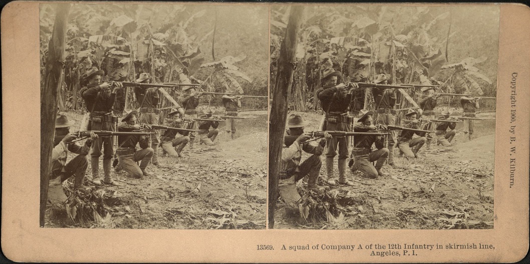 A squad of Company A of the 12th Infantry in skirmish line, Angeles, P. I.